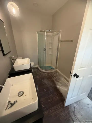 a bathroom with a sink and toilet