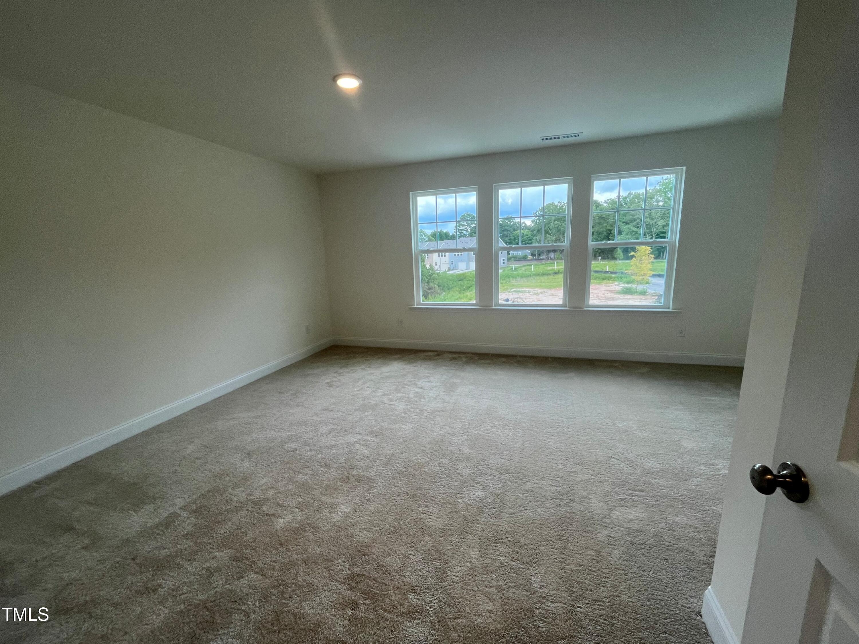 6123 Arsenal Avenue Raleigh, NC 27610 - Photo 23 of 56 Primary Suite w/lots of windows