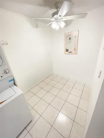 a view of a livingroom with an fan
