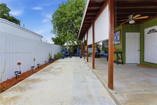 a view of a street with the trees in front of it