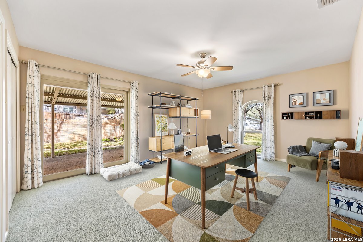 9106 Sundew Circle Garden Ridge, TX 78266 - Photo 15 of 29 a view of a livingroom with furniture and a window