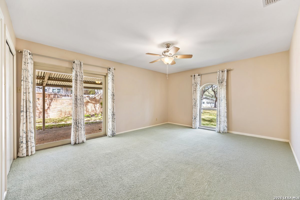 9106 Sundew Circle Garden Ridge, TX 78266 - Photo 16 of 29 an empty room with windows