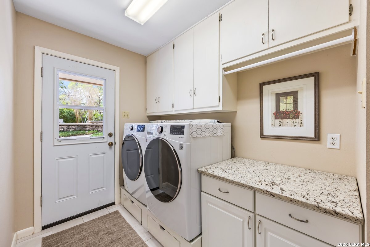 9106 Sundew Circle Garden Ridge, TX 78266 - Photo 19 of 29 a utility room with dryer and washer