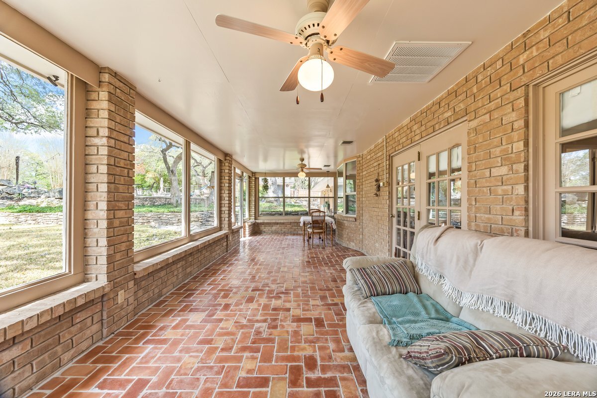 9106 Sundew Circle Garden Ridge, TX 78266 - Photo 21 of 29 a living room with furniture and a large window