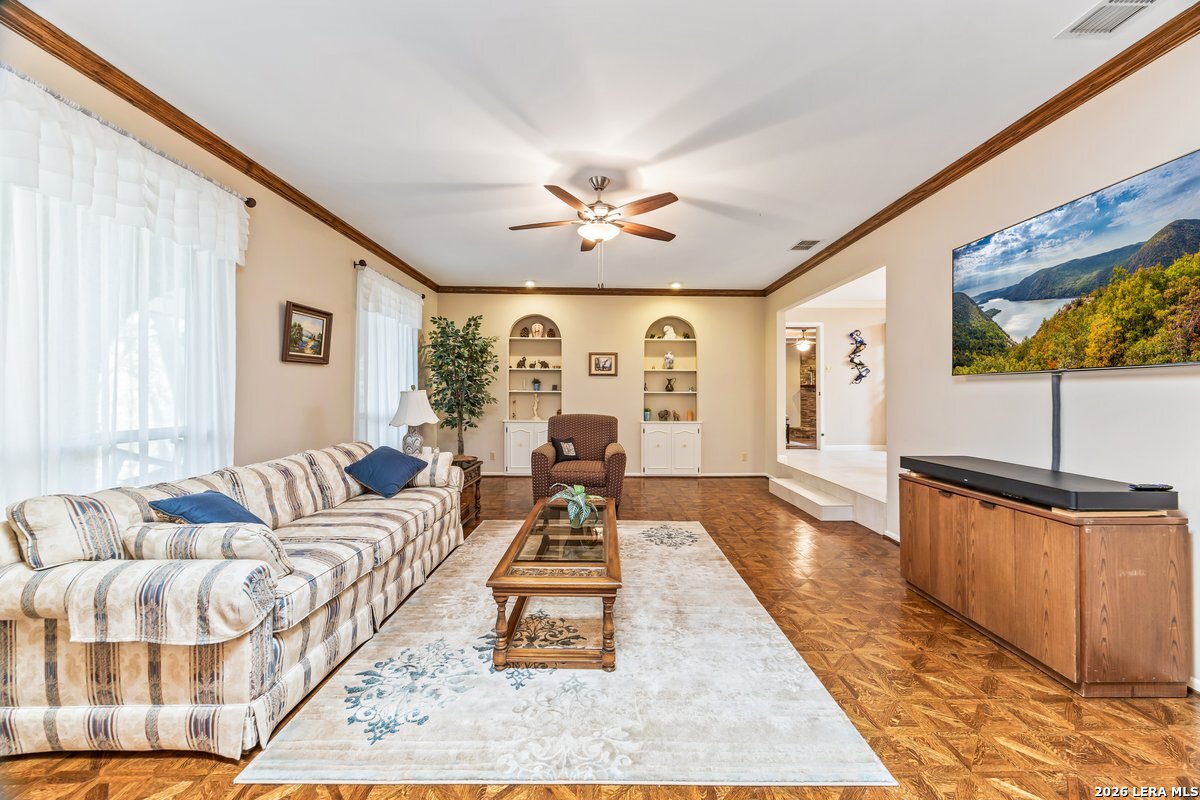 9106 Sundew Circle Garden Ridge, TX 78266 - Photo 6 of 29 a living room with furniture and a flat screen tv