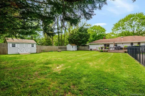 a house view with a garden space