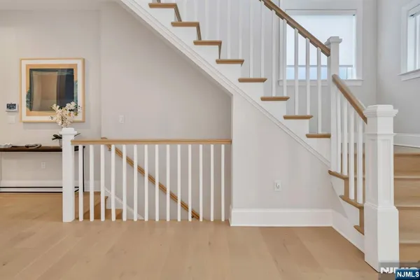 a view of a hallway with staircase