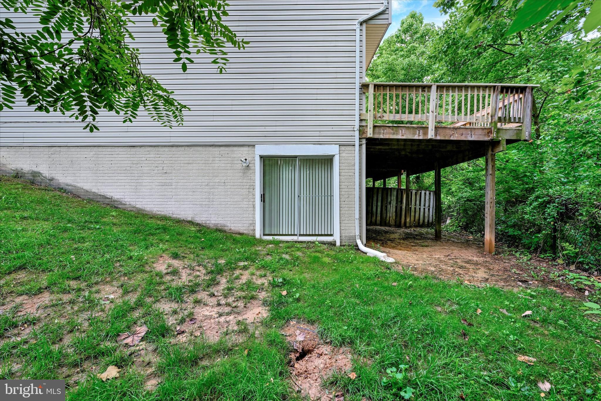6712 Shakerwood Road Rosedale, MD 21237 - Photo 23 of 27 Side Exterior View & Basement Walkout