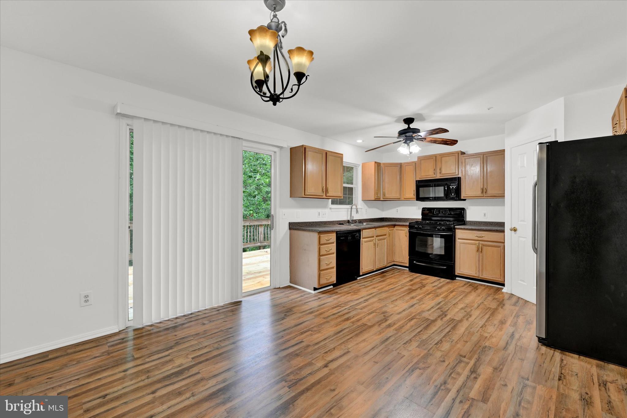 6712 Shakerwood Road Rosedale, MD 21237 - Photo 7 of 27 Walkout Deck off of Kitchen