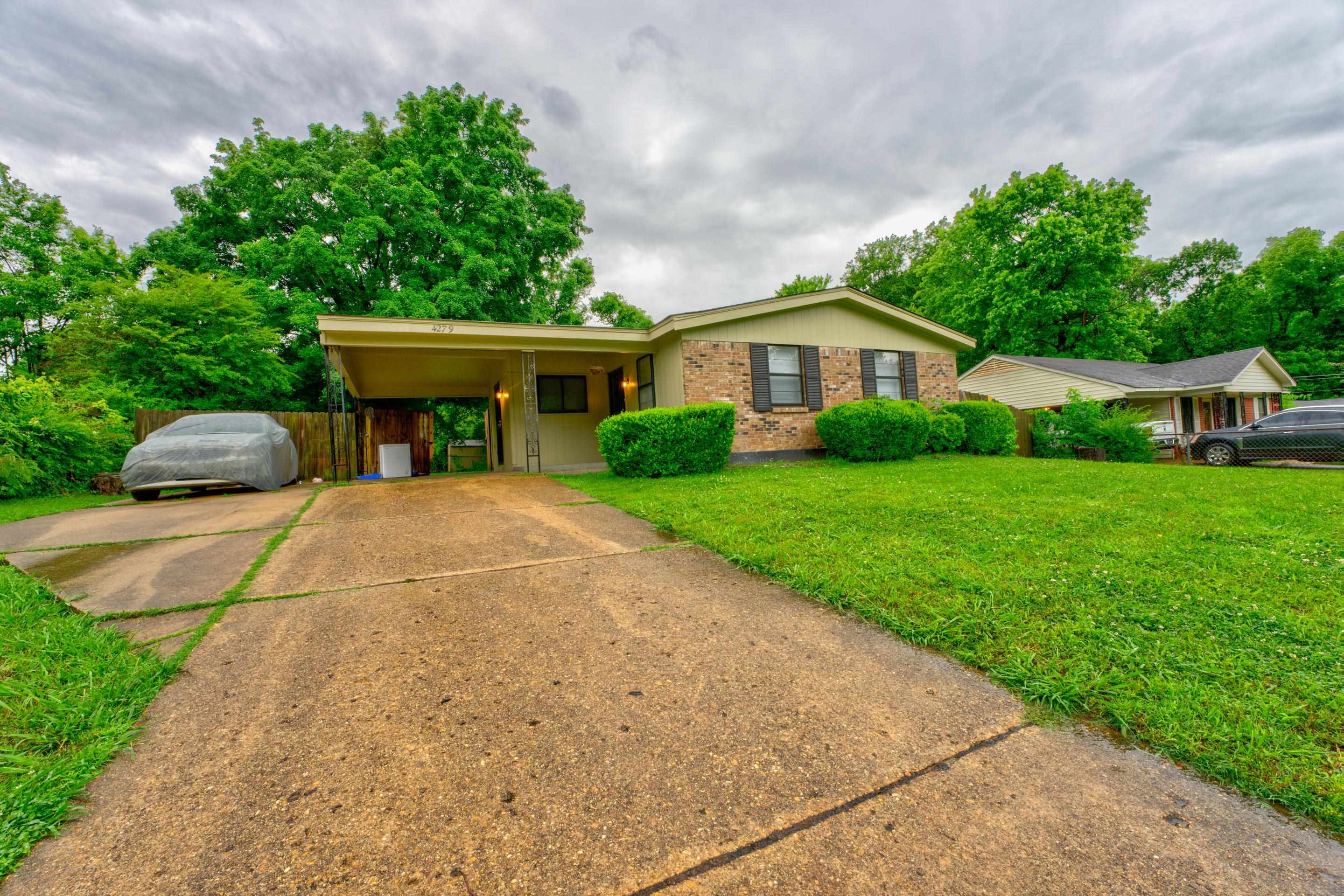 4279 University Street Memphis, TN 38127 - Photo 1 of 1 a house view with a garden space
