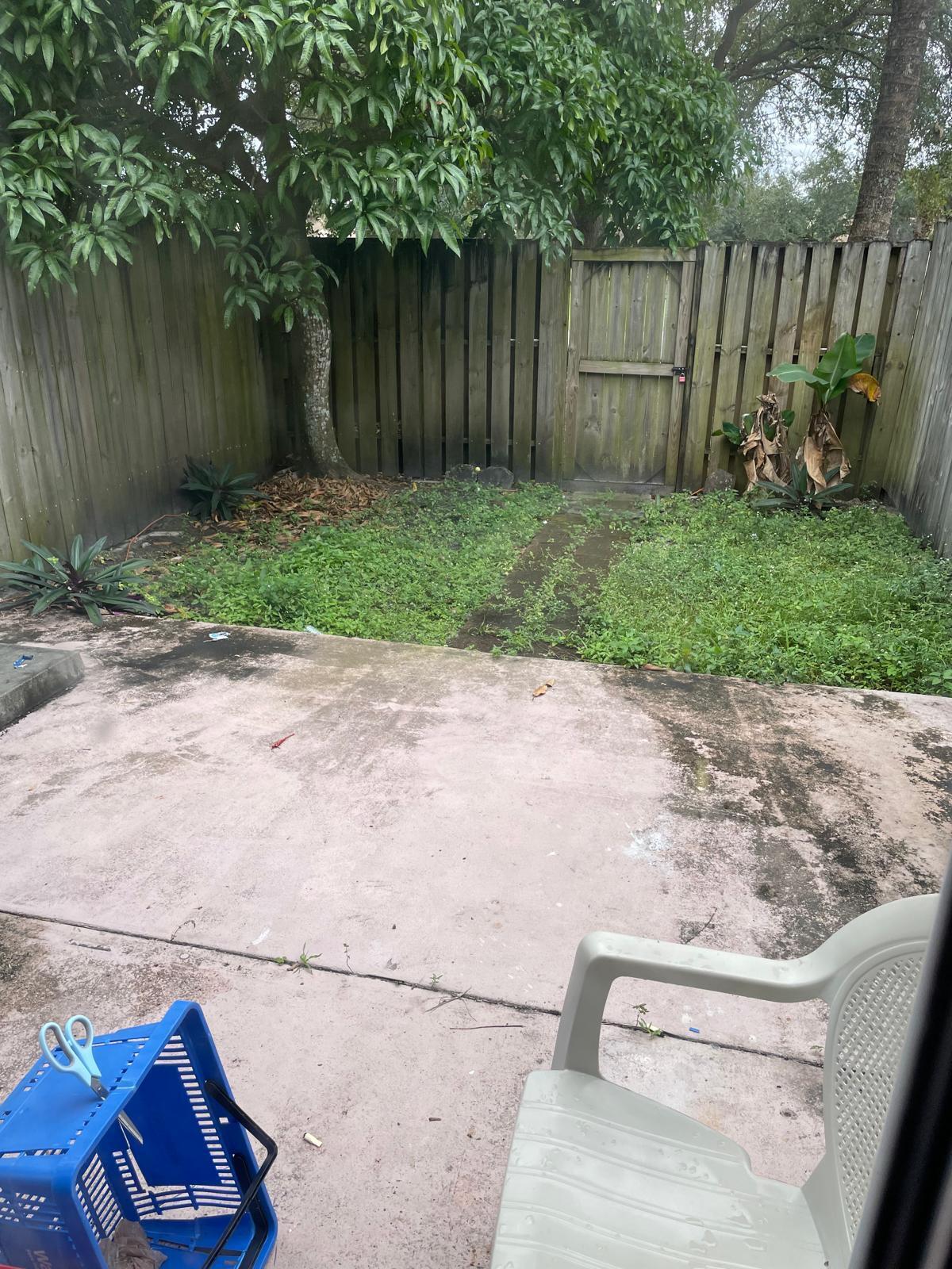 8249 Fairway Road Sunrise, FL 33351 - Photo 11 of 12 a view of backyard with green space