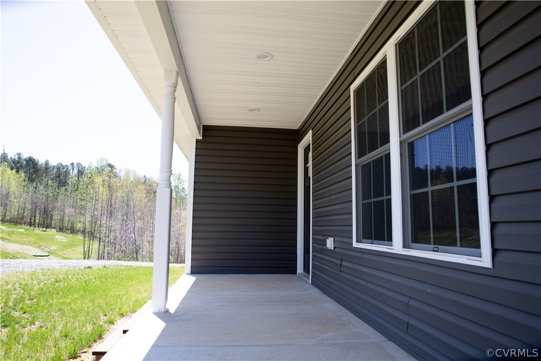 676 Mill Road Dillwyn, VA 23936 - Photo 3 of 35 a view of a house with a backyard