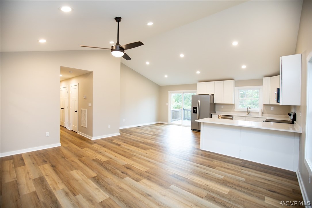 676 Mill Road Dillwyn, VA 23936 - Photo 5 of 35 a open kitchen view with stainless steel appliances granite countertop a stove and a refrigerator