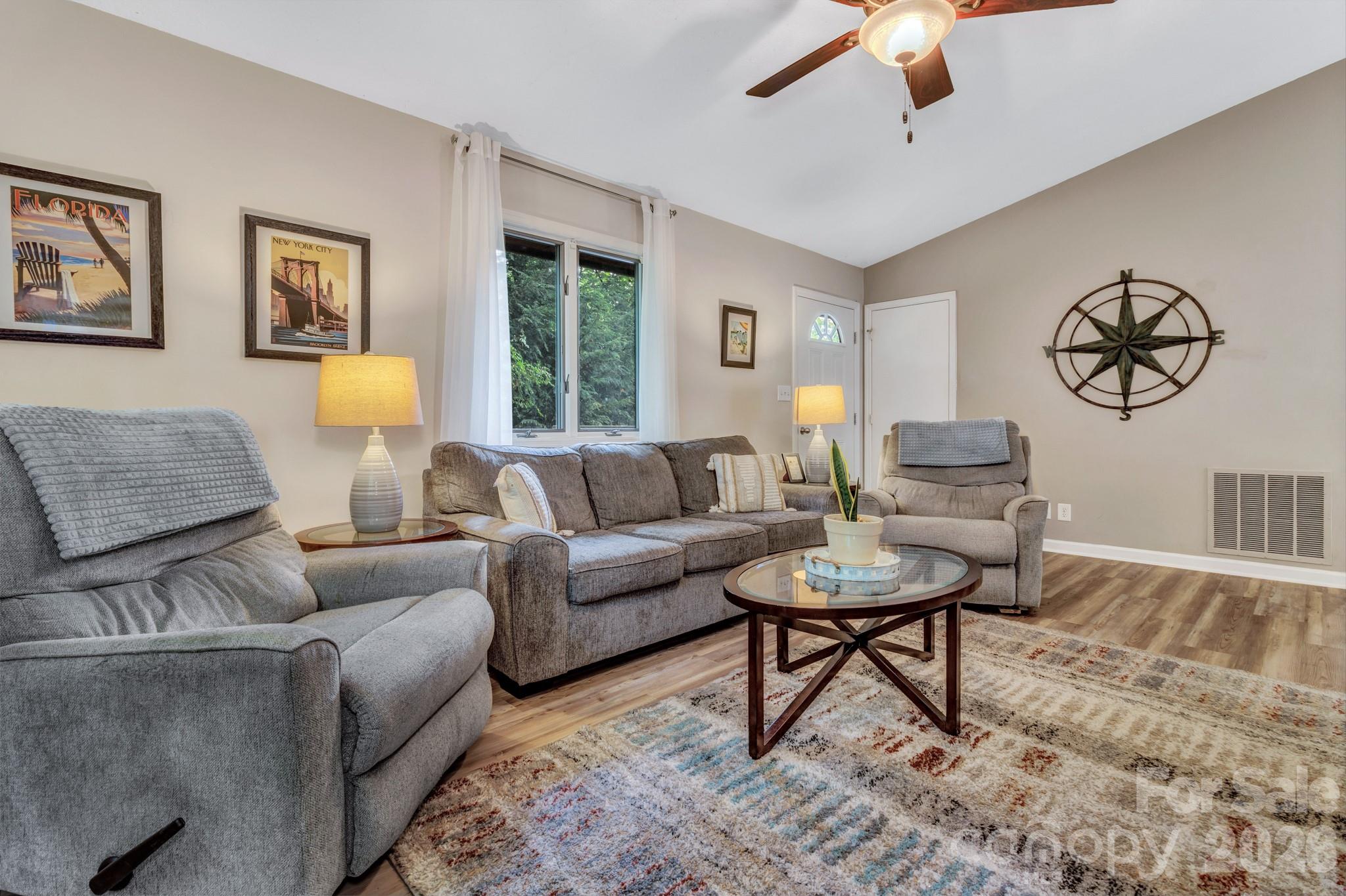 603 Rose Hill Road Asheville, NC 28803 - Photo 14 of 43 a living room with furniture and a large window