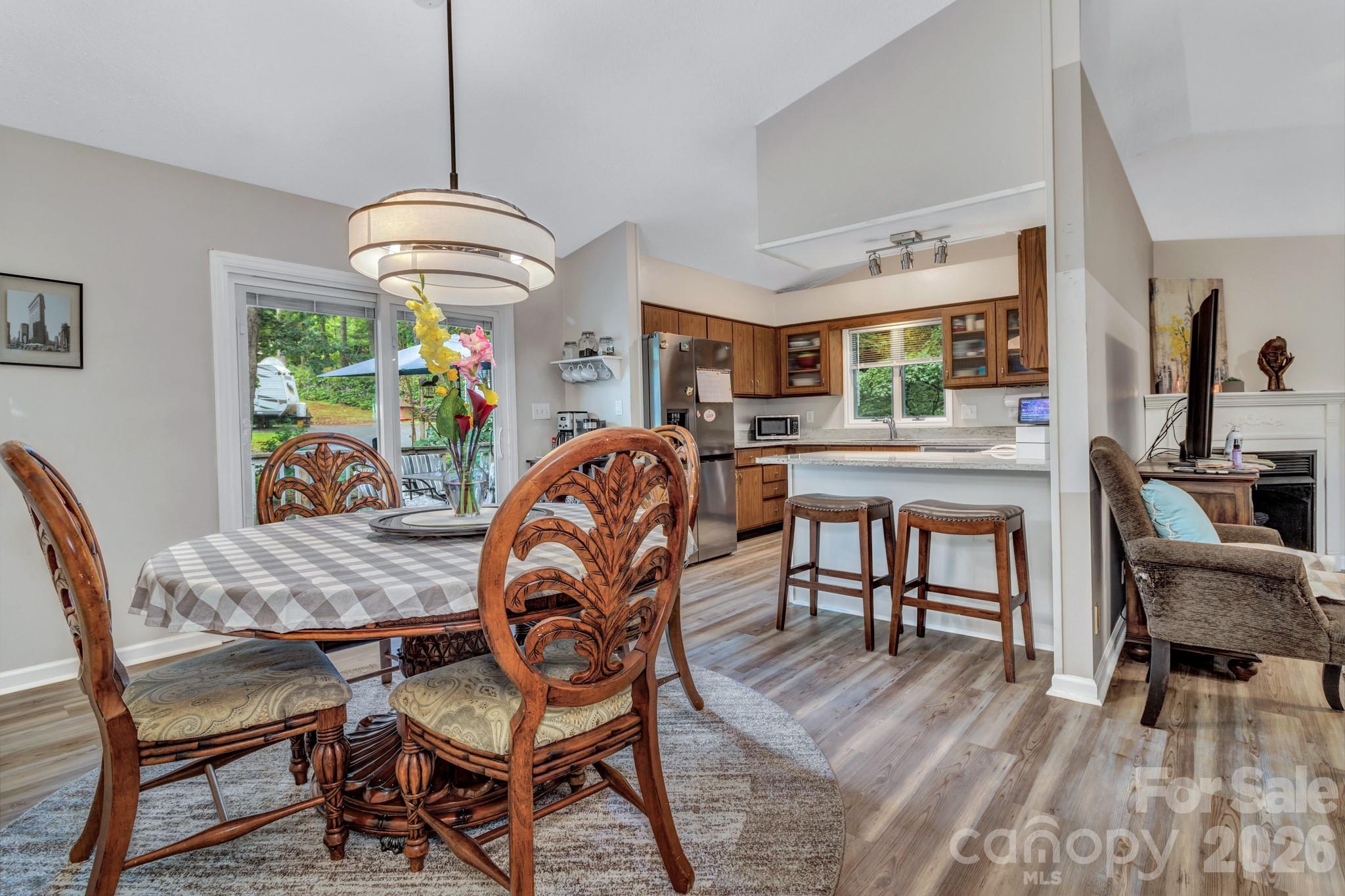 603 Rose Hill Road Asheville, NC 28803 - Photo 20 of 43 a view of a dining room with furniture window and wooden floor