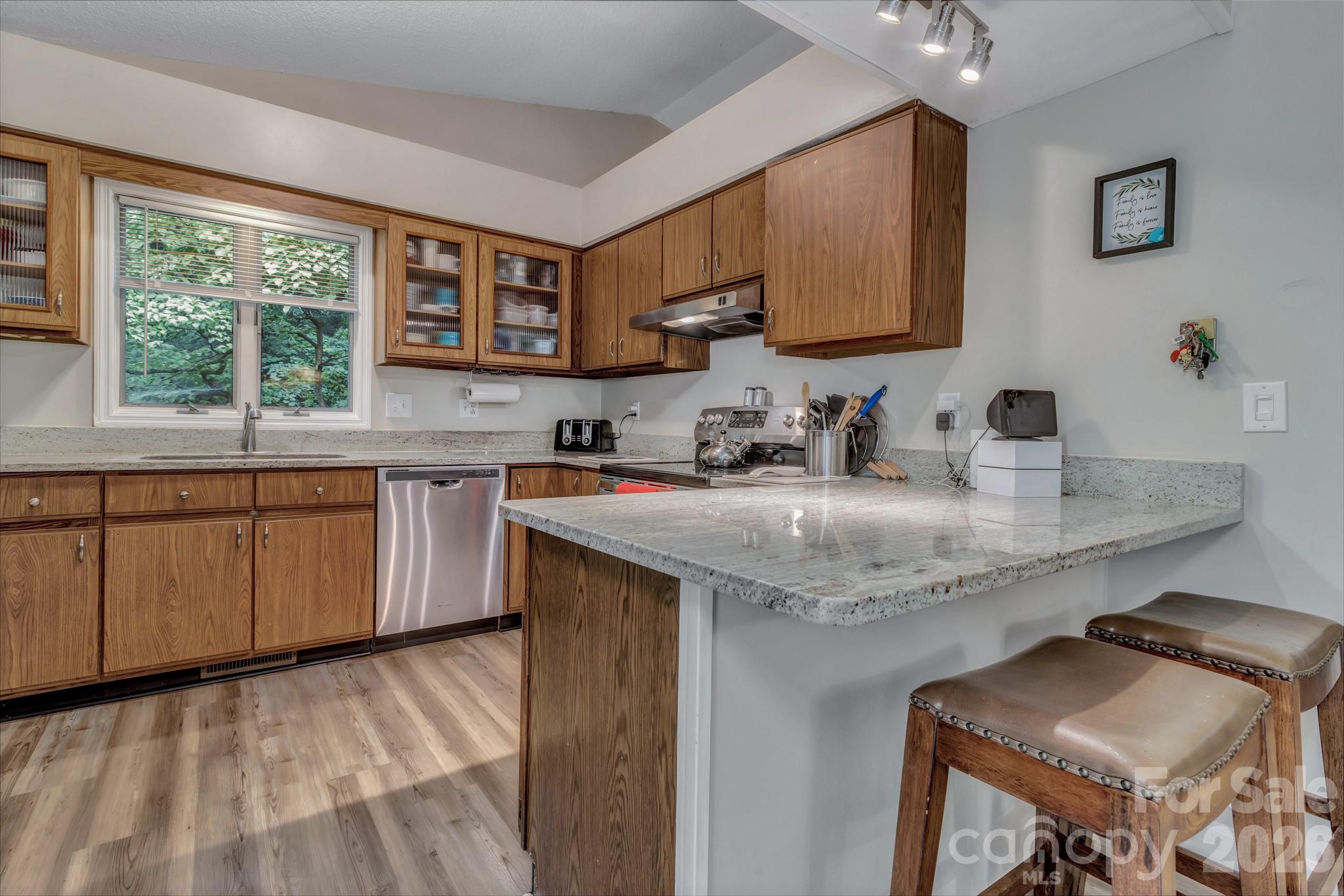 603 Rose Hill Road Asheville, NC 28803 - Photo 27 of 43 a kitchen with a sink cabinets and window