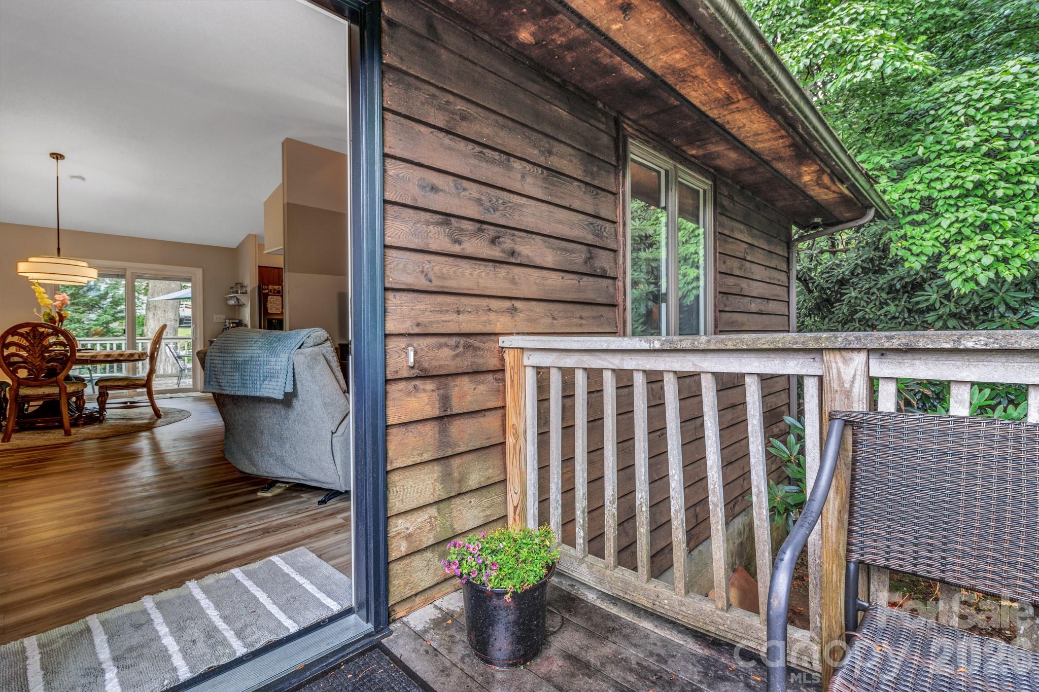 603 Rose Hill Road Asheville, NC 28803 - Photo 3 of 43 a view of a porch with wooden floor