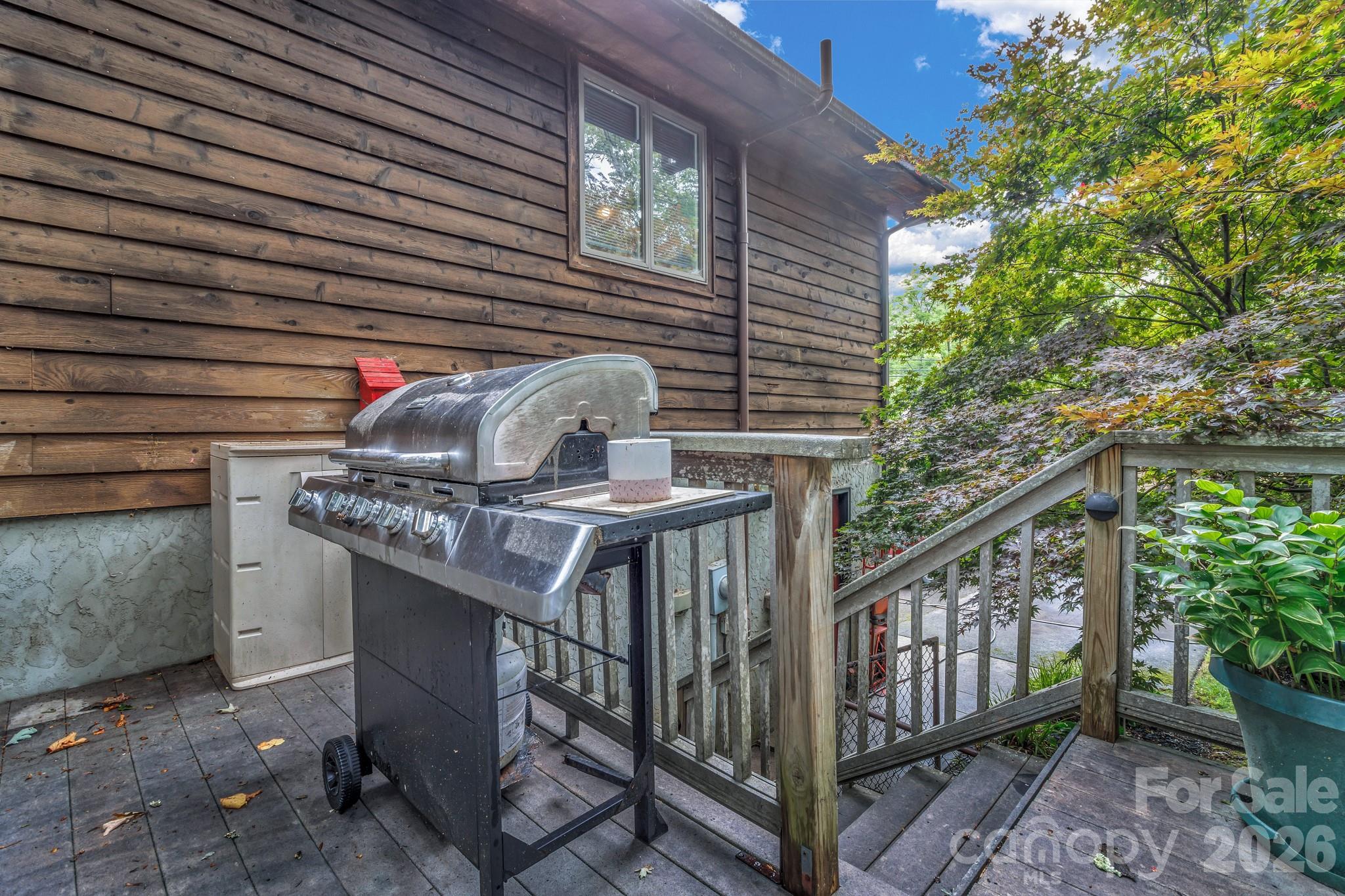 603 Rose Hill Road Asheville, NC 28803 - Photo 43 of 43 a view of a balcony with stainless steel appliances