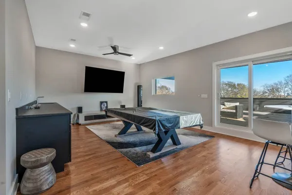 a kitchen with a table and chairs in it