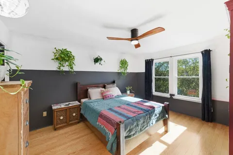 a view of a hallway with entryway doors