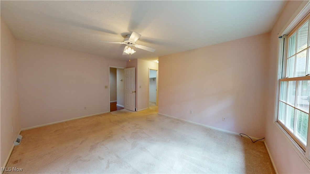 30102 Rickey Lane Wickliffe, OH 44092 - Photo 22 of 44 Unfurnished room featuring light carpet and ceiling fan
