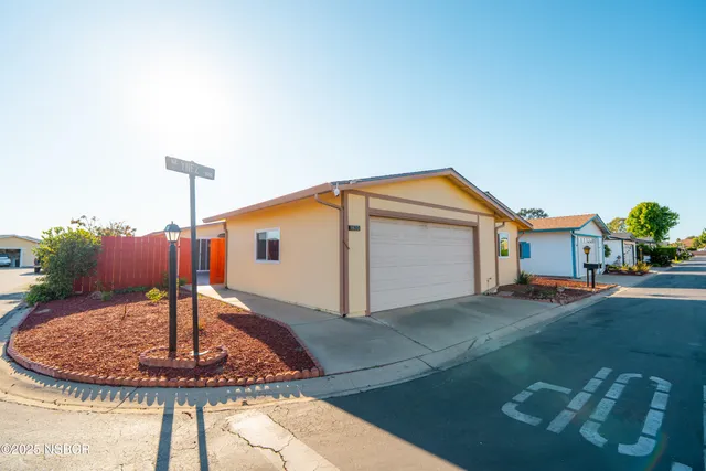 a front view of a house with entertaining space