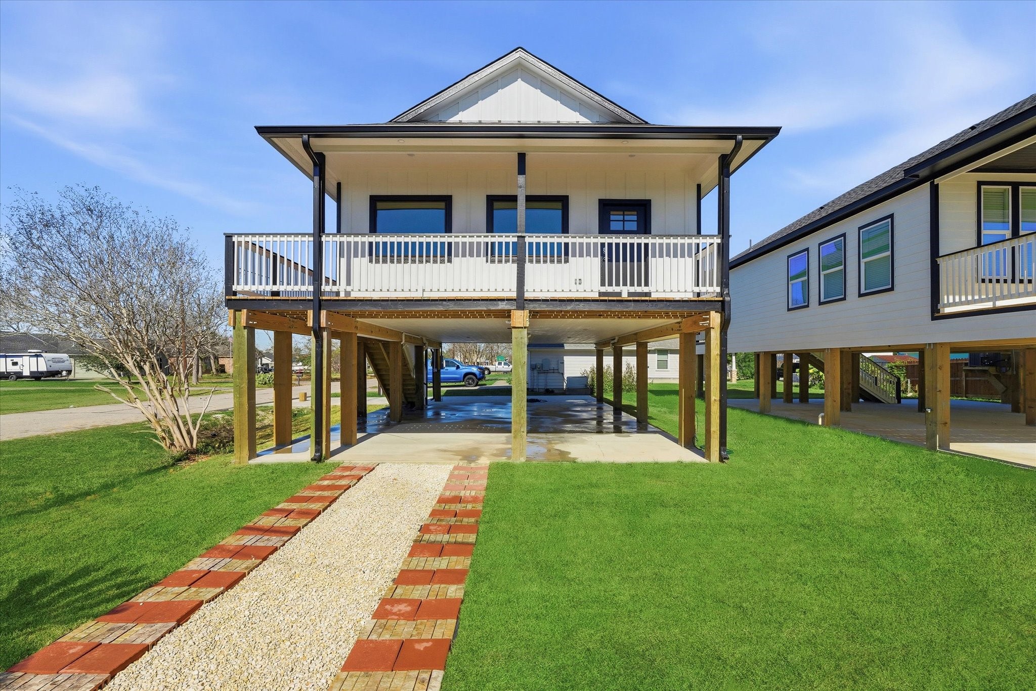 230 South Y Street La Porte, TX 77571 - Photo 1 of 15 a view of a house with a yard and deck