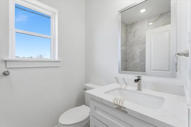 a bathroom with a sink and a toilet