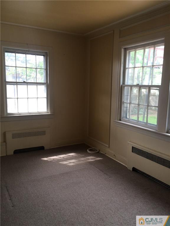 95 Westons Mill Road East Brunswick, NJ 08816 - Photo 19 of 22 an empty room with a window