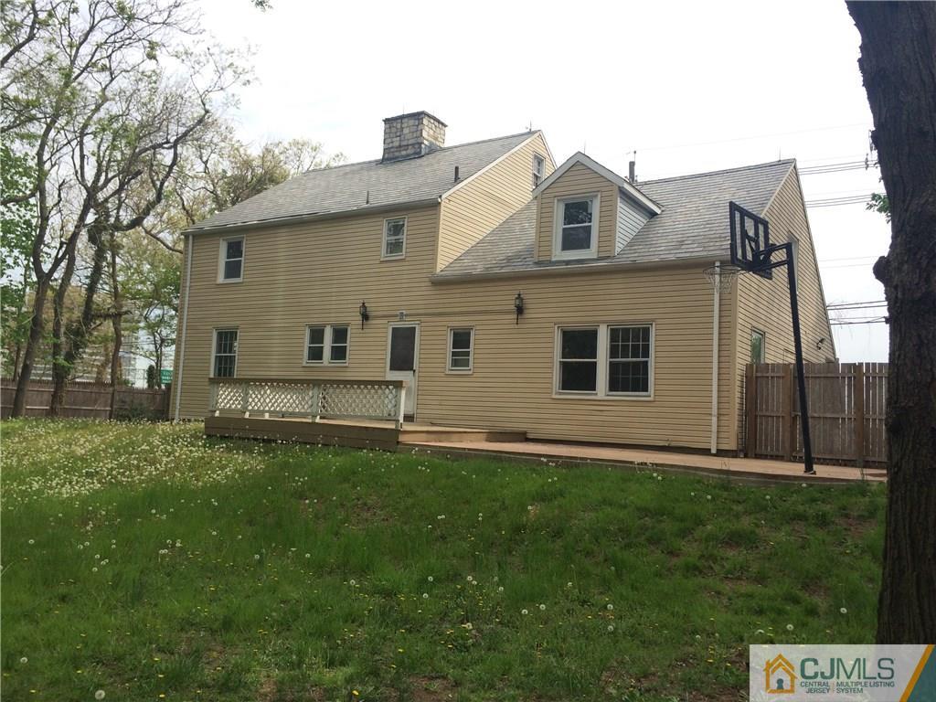 95 Westons Mill Road East Brunswick, NJ 08816 - Photo 22 of 22 a front view of a house with a garden