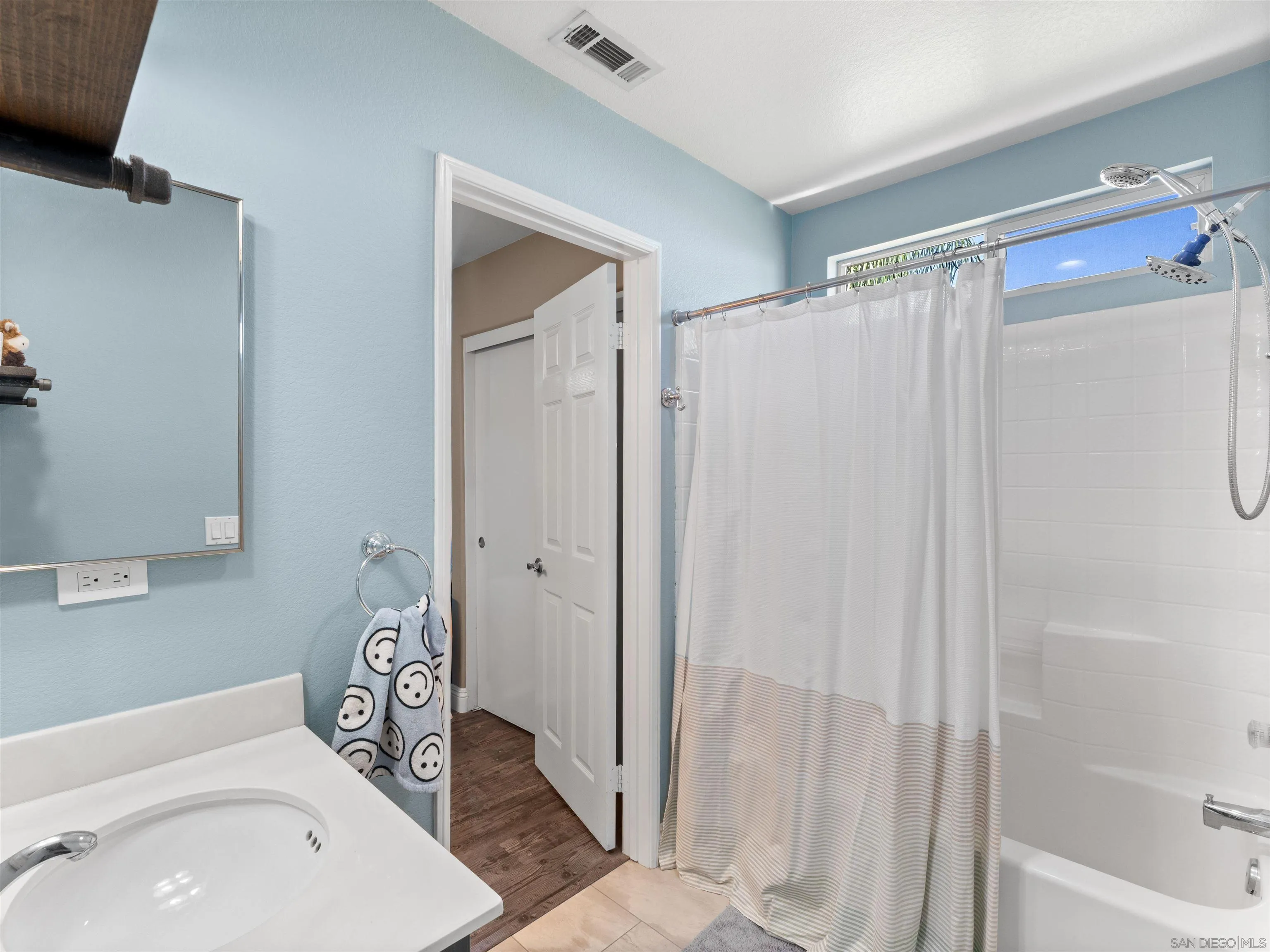 2925 Sunhaven Court Alpine, CA 91901 - Photo 14 of 19 a bathroom with a sink toilet and shower