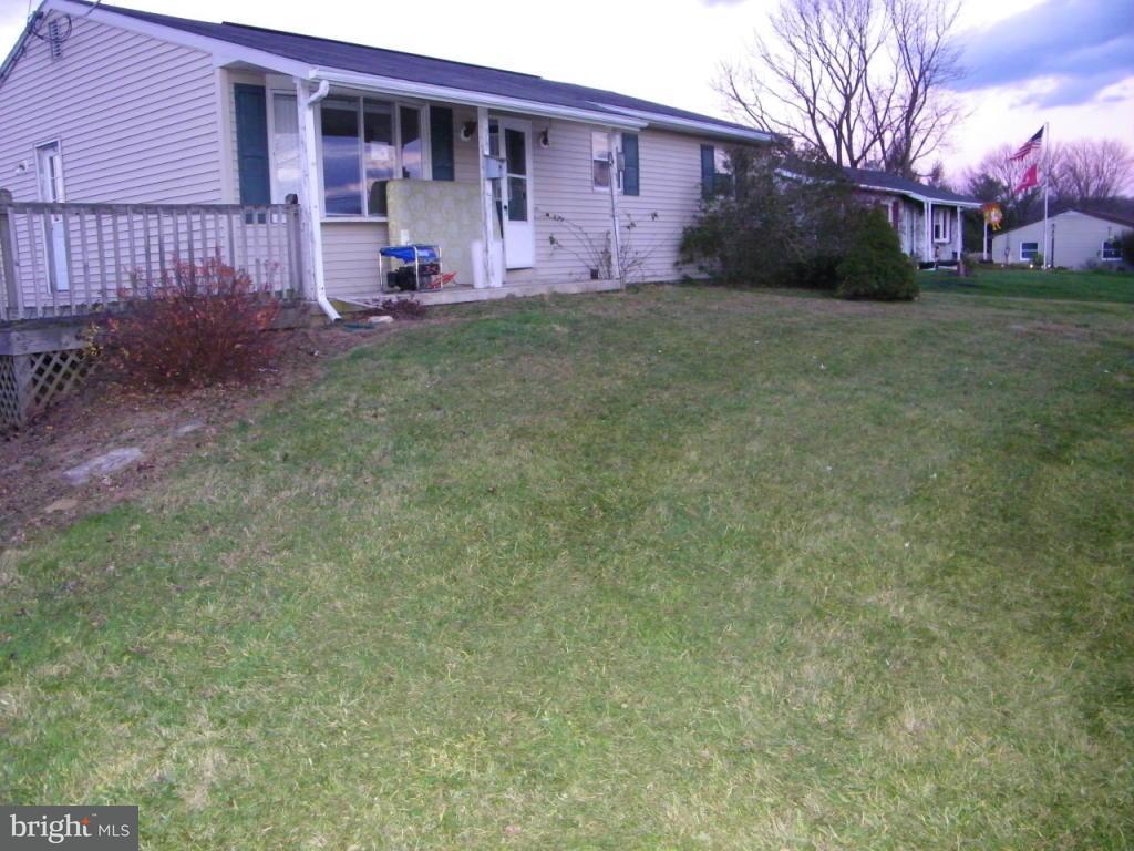 257 Frogtown Road Pequea, PA 17565 - Photo 1 of 9 a view of a house with backyard and a tree