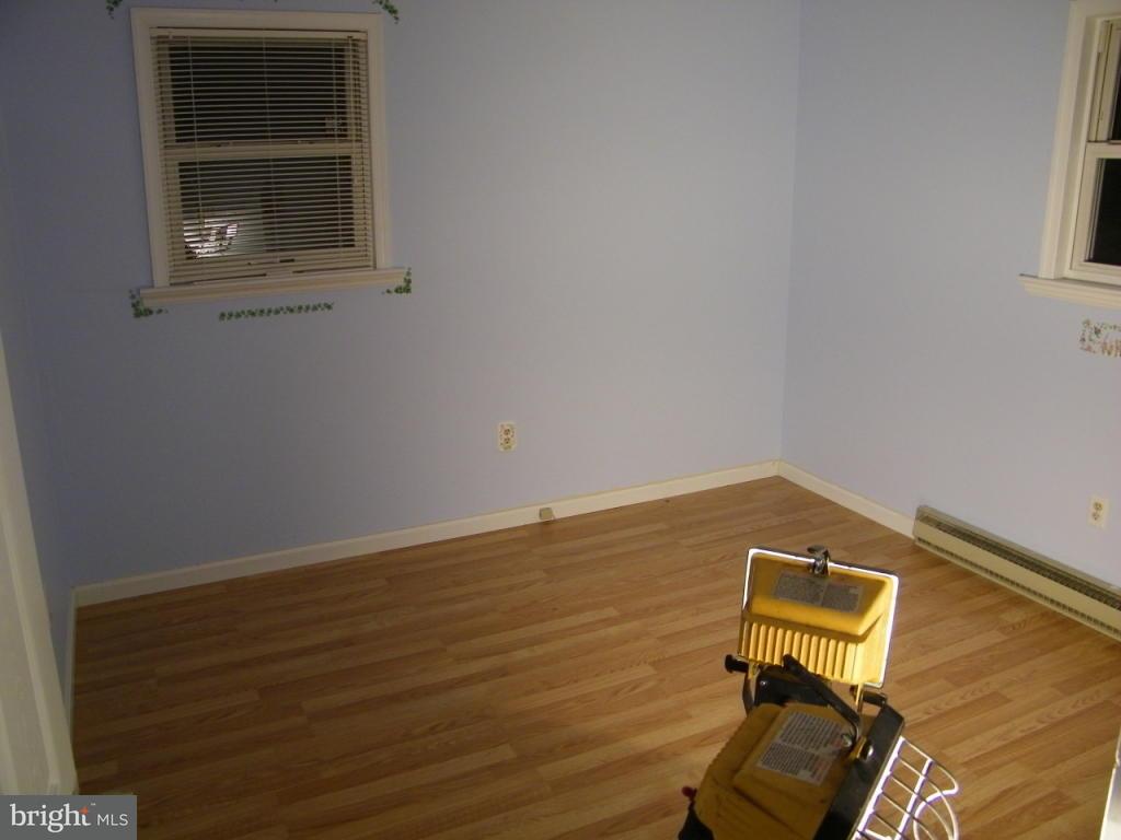 257 Frogtown Road Pequea, PA 17565 - Photo 5 of 9 a view of a room with rack and wooden floor