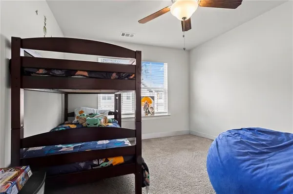 a room with furniture and a rug