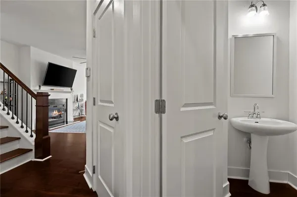 a bathroom with a sink a mirror and shower