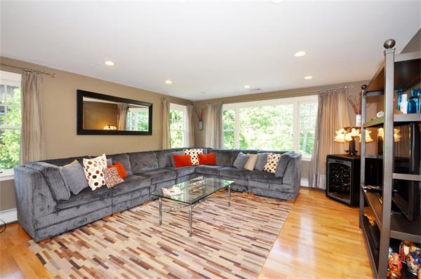65 Columbia Road Arlington, MA 02474 - Photo 12 of 30 a living room with furniture and a large window