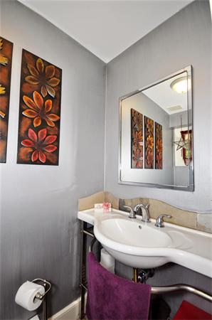 65 Columbia Road Arlington, MA 02474 - Photo 21 of 30 a bathroom with a sink and a mirror