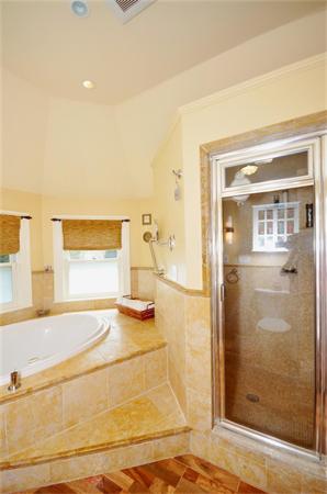 65 Columbia Road Arlington, MA 02474 - Photo 25 of 30 a bathroom with a bathtub and a shower