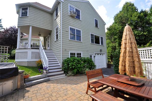 65 Columbia Road Arlington, MA 02474 - Photo 30 of 30 a view of a house with backyard and sitting area