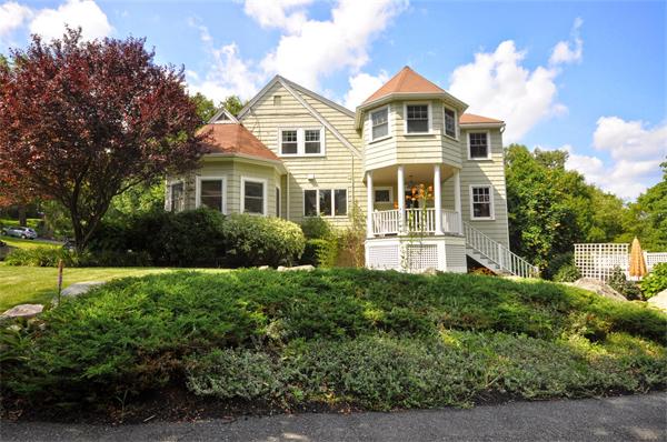 65 Columbia Road Arlington, MA 02474 - Photo 3 of 30 a front view of a house with a yard