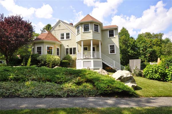 65 Columbia Road Arlington, MA 02474 - Photo 4 of 30 a front view of a house with a yard