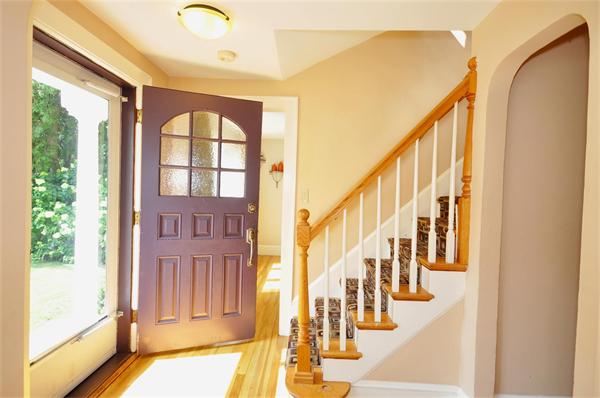 65 Columbia Road Arlington, MA 02474 - Photo 5 of 30 a view of an entryway with staircase