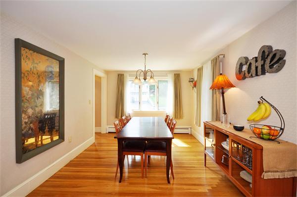 65 Columbia Road Arlington, MA 02474 - Photo 7 of 30 a living room with furniture and wooden floor