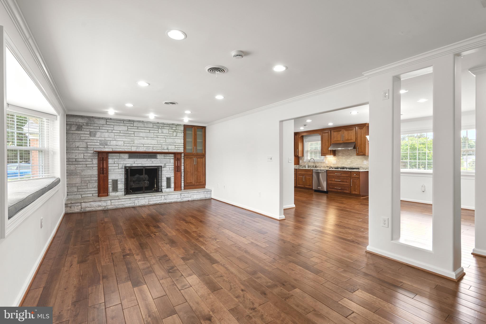 12416 West Old Baltimore Road Boyds, MD 20841 - Photo 6 of 39 Living room opens to the kitchen
