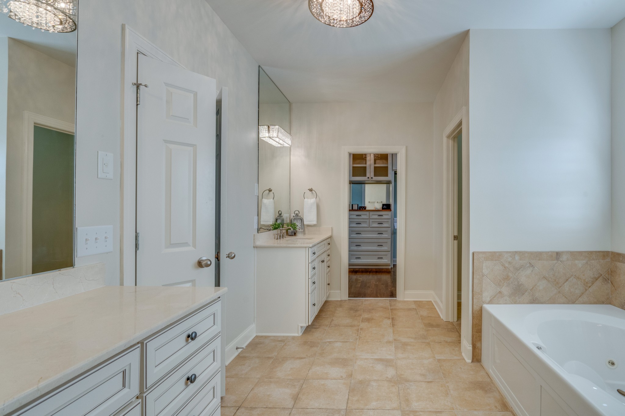 149 Keller Trail Franklin, TN 37064 - Photo 22 of 42 a bathroom with a tub sink and mirror