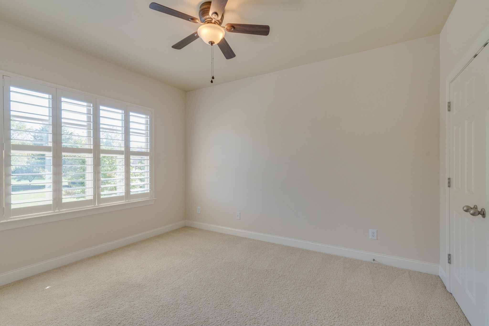 149 Keller Trail Franklin, TN 37064 - Photo 35 of 42 an empty room with a window and a fan