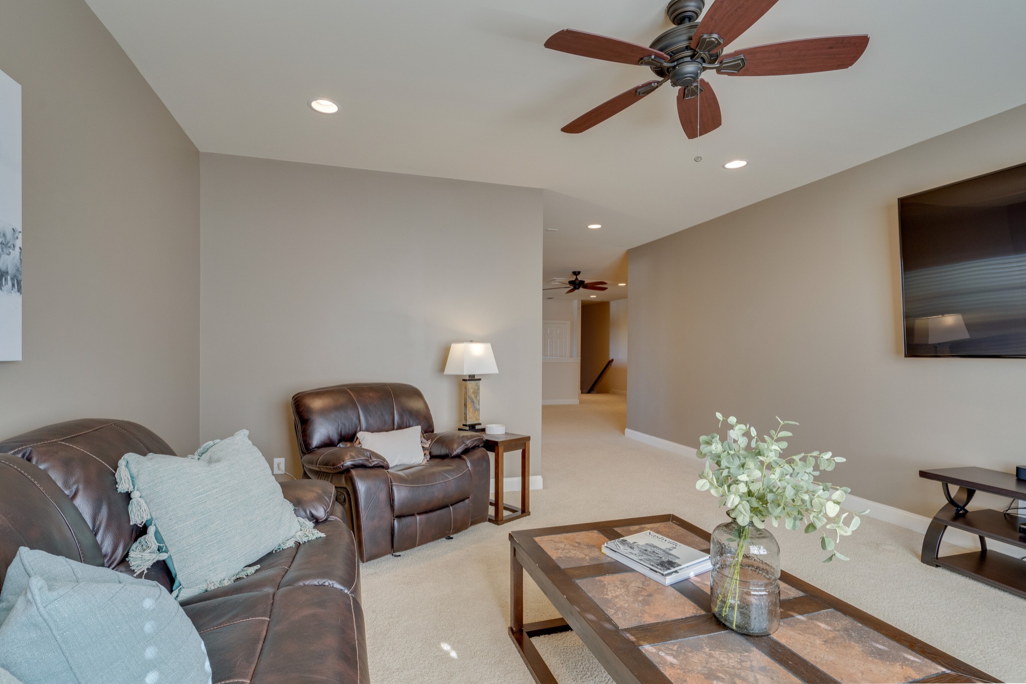 149 Keller Trail Franklin, TN 37064 - Photo 38 of 42 a living room with furniture and a potted plant