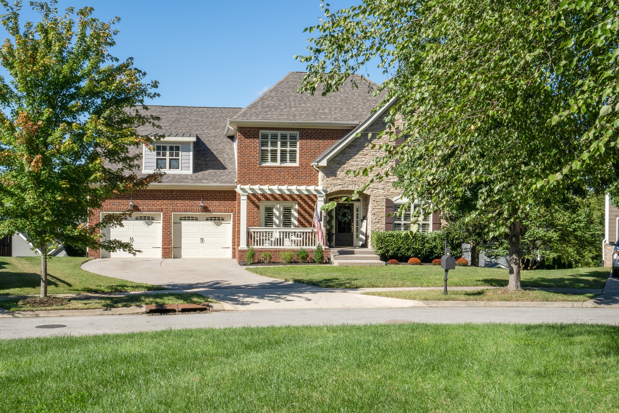 149 Keller Trail Franklin, TN 37064 - Photo 42 of 42 a front view of a house with a yard and trees