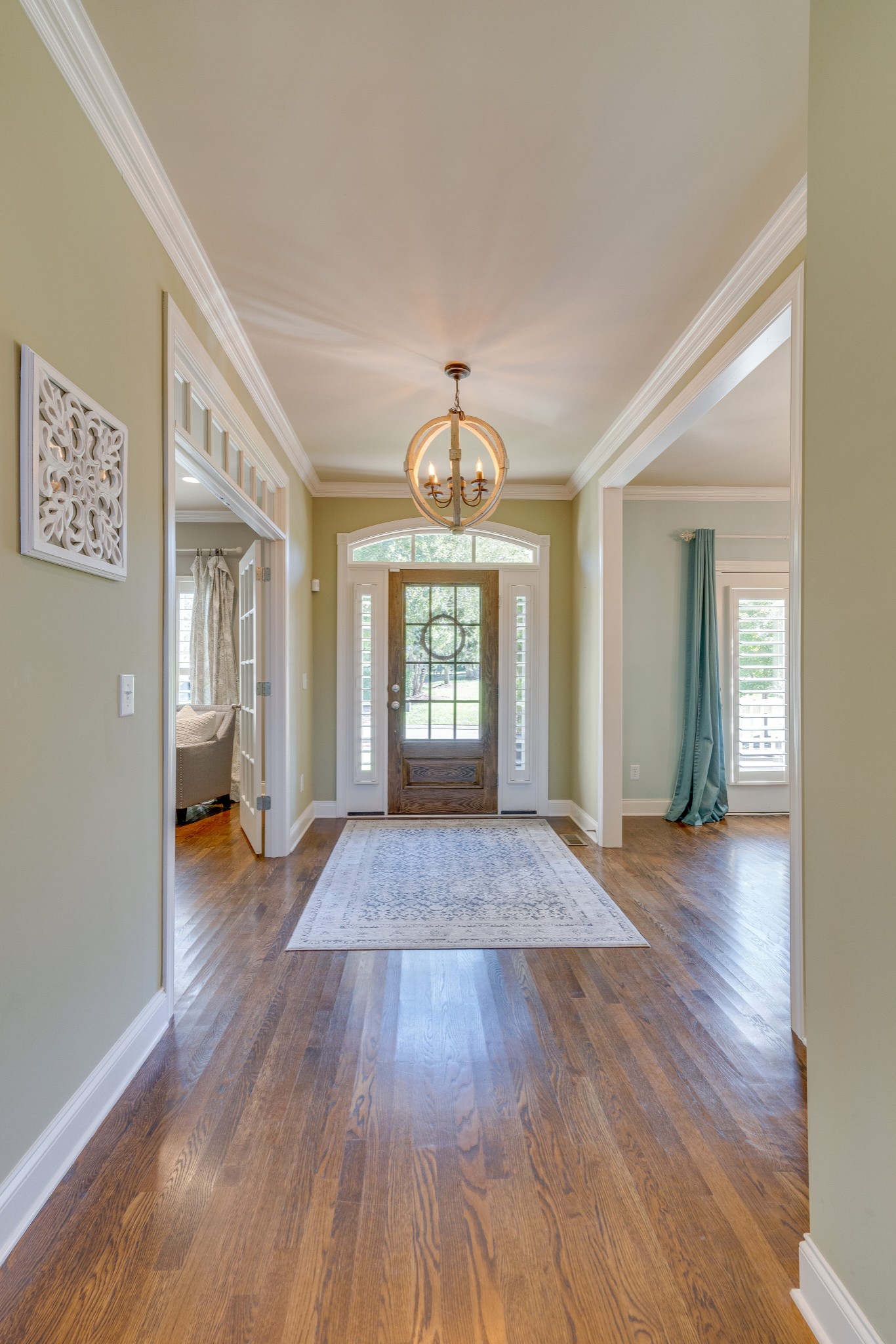 149 Keller Trail Franklin, TN 37064 - Photo 5 of 42 a view of an empty room with wooden floor and a window