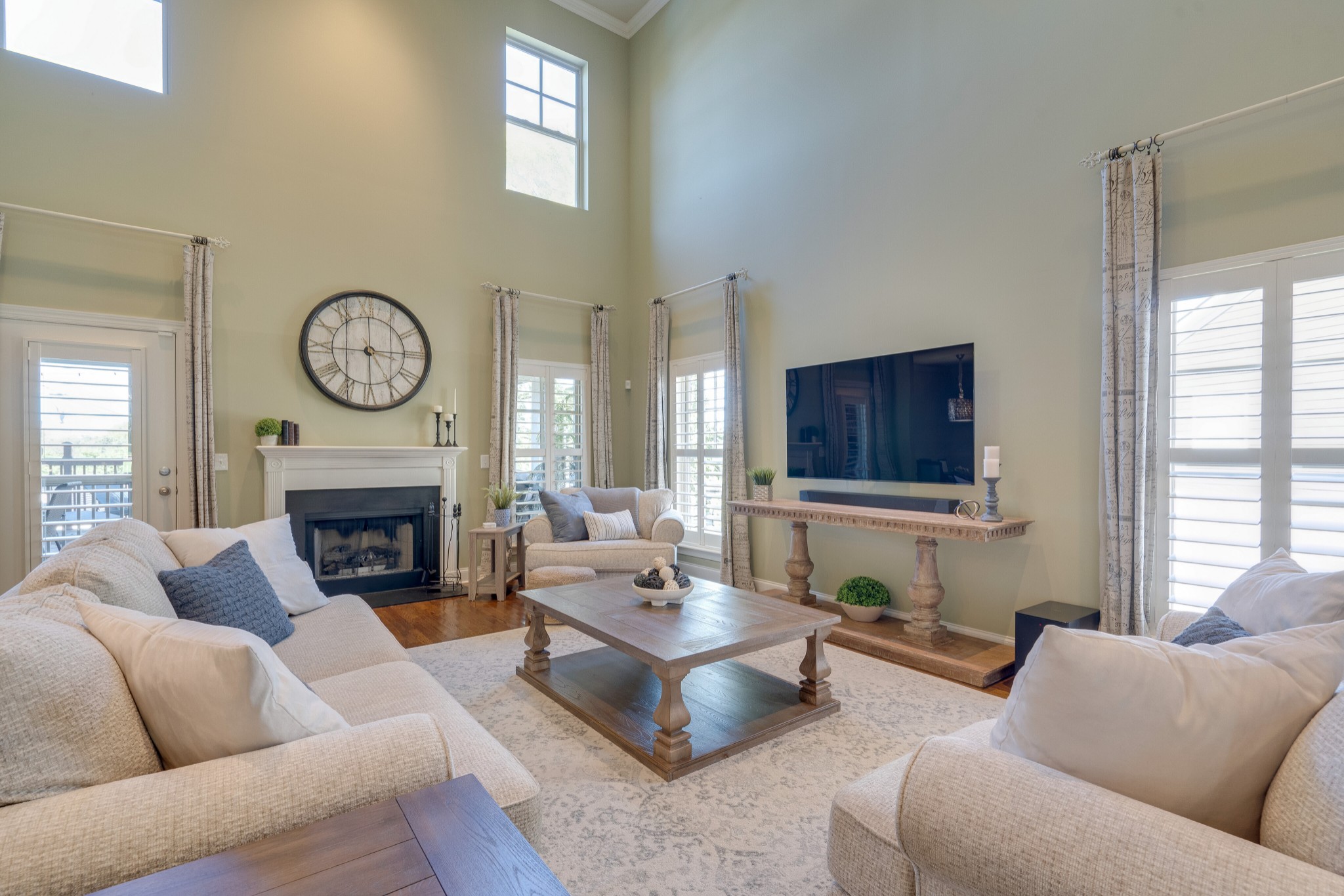 149 Keller Trail Franklin, TN 37064 - Photo 7 of 42 a living room with furniture a fireplace and a large window